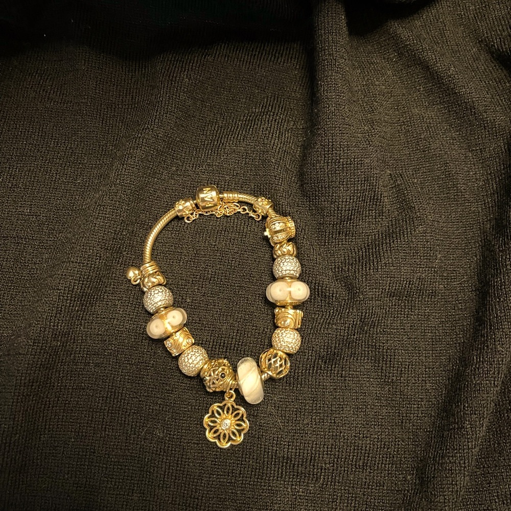 Pandora 14k gold bracelet and charms